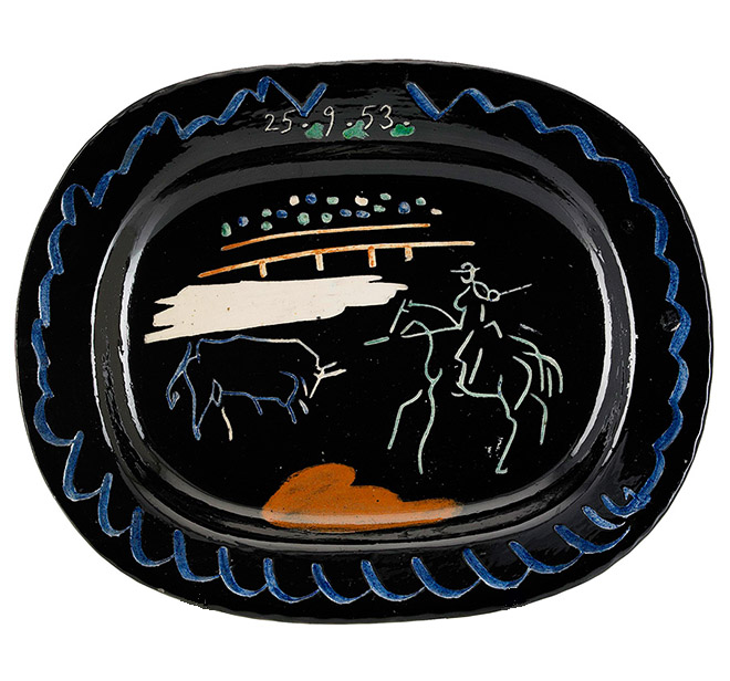 Glazed white earthenware dish painted in colors, 1953, from the edition of 500, with the 'EDITION PICASSO' and 'MADOURA PLEIN FEU' pottery stamps on the underside, generally in very good condition Diameter: 15 in. (381 mm.)